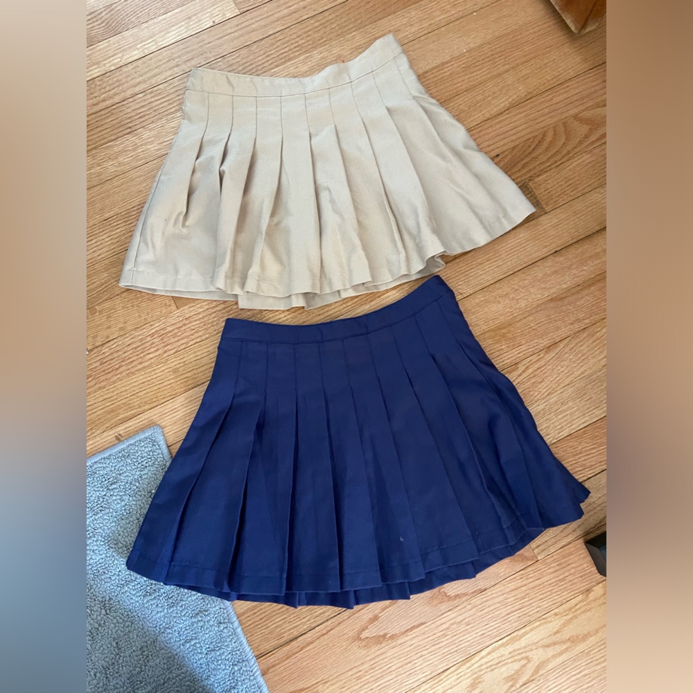 2 pleated skirts